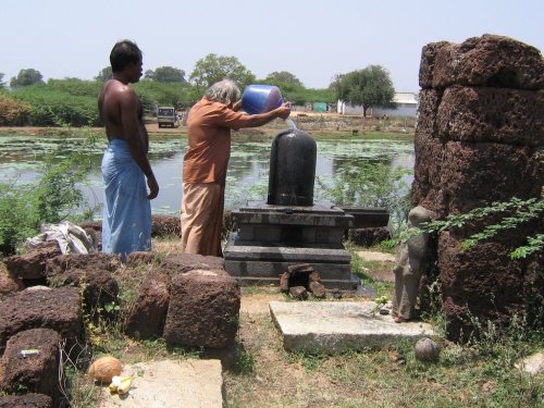 Worshiping Shiva at ruined temple, Tamil Nadu