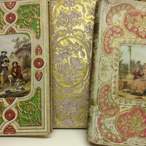Embossed bindings in the Loring collection. Many of these, you can see on the spine, are from A. Mam