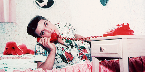 vinceveretts:  Elvis at his Audubon Drive home, photographed by Bob Williams, 1956. 