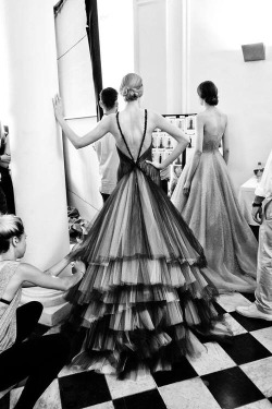 naimabarcelona:  A Rami Al Ali model shows off the dramatic back to her gown.