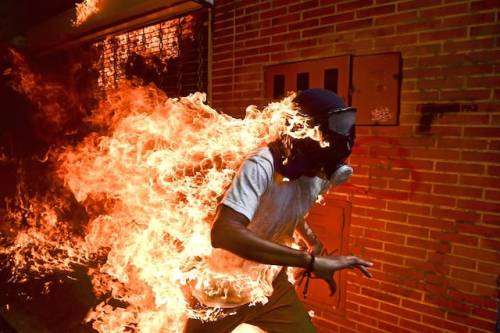 politics-war:  José Víctor Salazar Balza catches fire amid clashes with riot police du