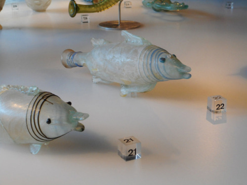 dwellerinthelibrary: Cheeky glass dolphins in the Römisch-Germanisches Museum, Cologne.