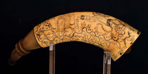 Ornately scrimshawed gunpowder horn belonging to John Norton, crafted by John Rous, circa French and