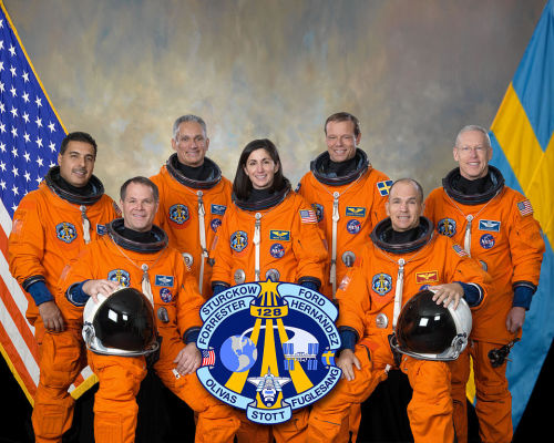 Official crew portrait of STS-128 - from left: Jose Hernandez (Mission Specialist), Kevin Ford (Comm