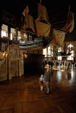 natgeofound:  Tourists in the old town hall of Bremen look up at a model ship in Germany, January 1969.Photograph by James P. Blair, National Geographic