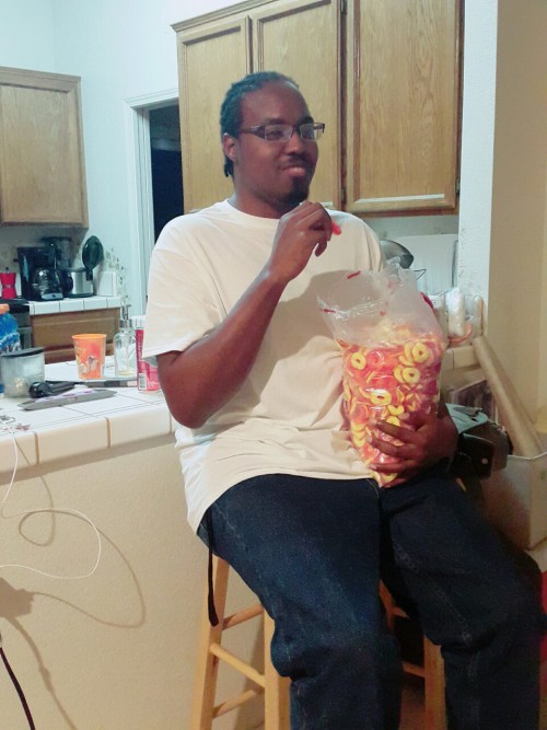 bug-dad: My friend Chris bought a 12 pound bag of peach rings and won’t put it down. 
