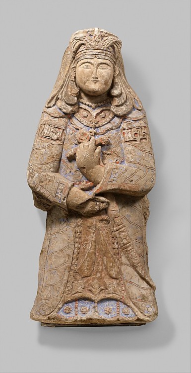 Princely Figure with Winged Crown Iran, 11th-12th century This large polychrome stucco sculpture of 