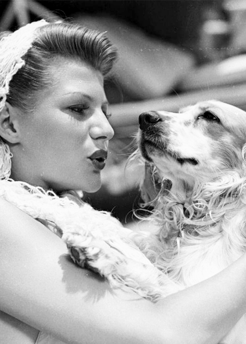 kellyreichardt:   Rita Hayworth photographed with her dog Pookles in the mid-1940’s  