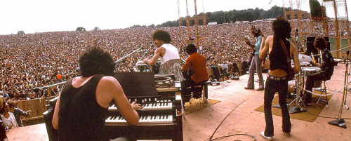Nice panorama shot of Santana playing at Woodstock, 1969Gregg Rolie, Mike Carabello, Jose Areas, Nei
