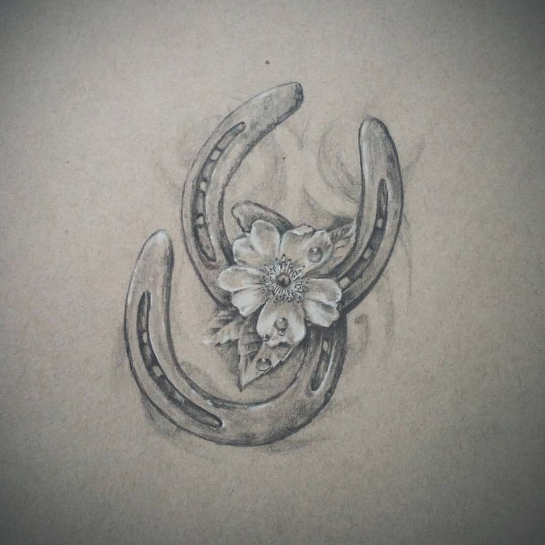 Horseshoe  Flowers Tattoo by Irit Gamburg