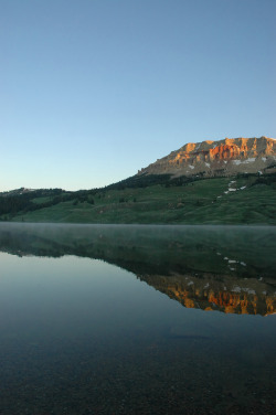 de-preciated:  Mountains Reflection by rdodson76 on Flickr. Source - (http://flic.kr/p/6j6eBT) A tranquil scene from the Shoshone National Forest in Wyoming. 