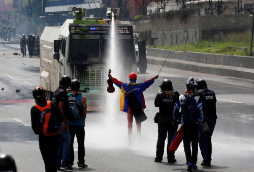 yahoonewsphotos: Venezuela’s symphony of protests Protesters play violins, flutes and guitars as they take to the streets of Caracas in demonstrations against President Nicolas Maduro. Venezuela’s opposition renewed nationwide protests to pressure