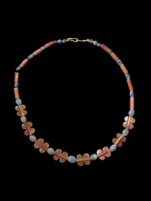 ancientjewels: Greek necklace of carnelian and lapis lazuli beads c. 2nd to 1st millenniums BCE. Mod
