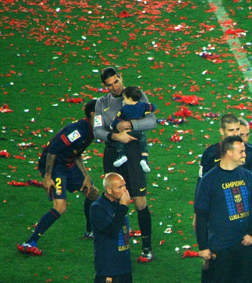 Dani Alves playing peek-a-boo with Nathan Pinto at the La Liga celebration