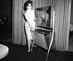 midcenturymodernfreak:  1970s Future…from 1961 TV viewers of the 1970s will see their programs on sets quite different from today’s, if designs now being worked out are developed. At the Home Furnishings Market in Chicago, Illinois, on June 21, 1961,