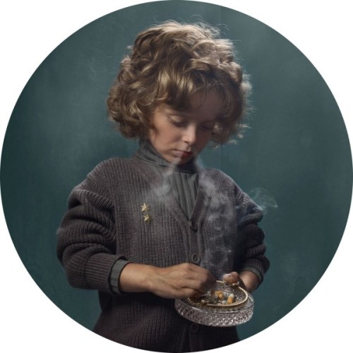 conveyerofcool:   Cool Photography: Smoking Kids Photographer Frieke Janssens poses young children with cigarettes. “I wanted to isolate the viewer’s focus on the issue of smoking itself. I felt that children smoking would have a surreal impact upon