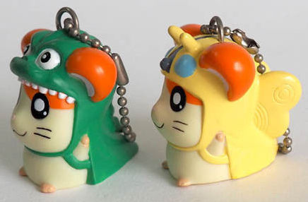 astoundingbeyondbelief:  Some toys from that odd three-year period where Toho released Godzilla and Hamtaro movies as double features. Photos from eBay. 