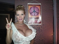 rudeboy308:  Peace, love, and huge tits!
