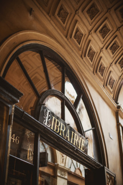 embergale:  shevyvision:  “Walking the stacks in a library, dragging your fingers across the spines — it’s hard not to feel the presence of sleeping spirits.”  ― Robin Sloan Librairie Ancienne et Moderne, Galerie Vivienne, Paris   @xanelen