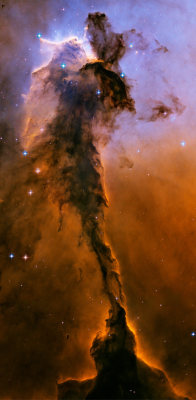 just&ndash;space:  Appearing like a winged creature poised on a pedestal, this object is actually a billowing tower of cold gas and dust rising from a stellar nursery called the Eagle Nebula. The soaring tower is 9.5 light-years high, about twice the