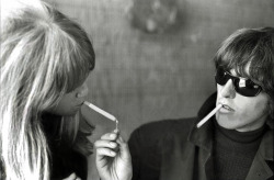 truthaboutthebeatlesgirls:March 1965 - George lighting Pattie’s cigarette at the Edelweiss Hotel in Obertauern, Austria - no tags!