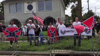 thingstolovefor:  Armed, Confederate flag-waving White Lives Matter protesters rally     Why are these people always finding reasons to hate the black race? If they truly wanted to help the black people, they would not be on the other side of the street