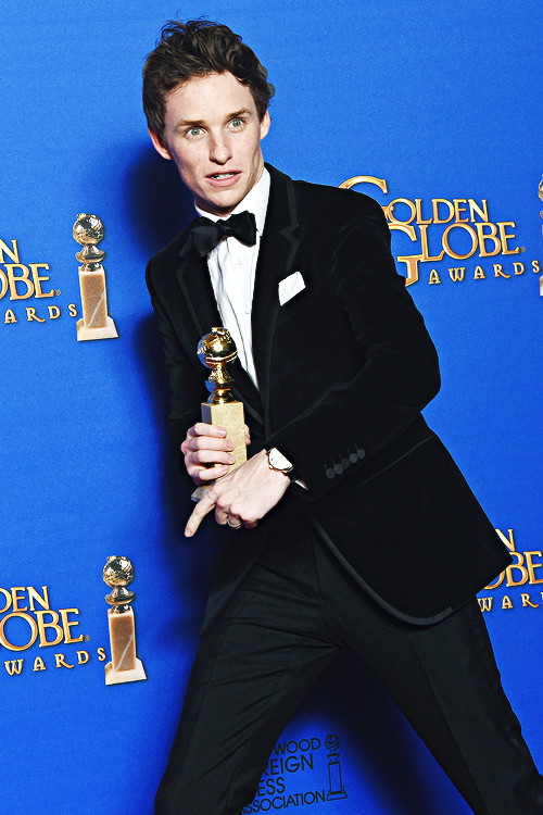 vikander:  Eddie Redmayne poses with the award for Best Actor - Motion Picture, Drama