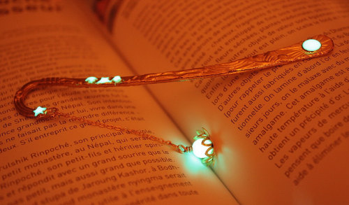 wickedclothes:Glow In The Dark Lotus BookmarkThis metal bookmark is accompanied by a lotus flower be