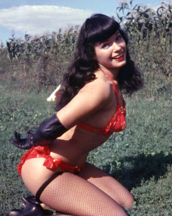 thequeenofpinup:   If my photographs speak to you, then I am happy. If I am remembered today, it is because you see something in me that I never saw in myself.  -Bettie Page  Bettie photographed in color by Art Amsie