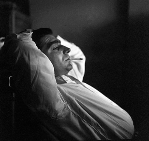 Robert Capa in Magnum Offices, Paris, 1949