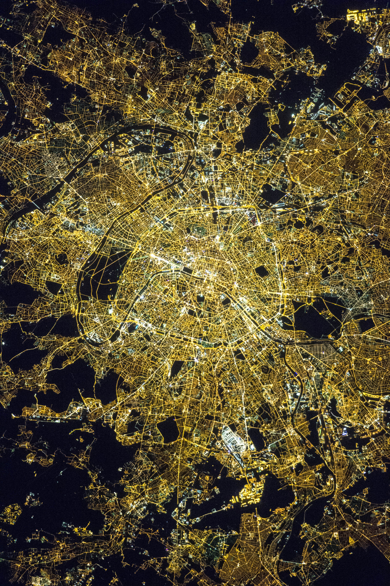 itsfullofstars:   The City of Lights At Night Around local midnight time on April