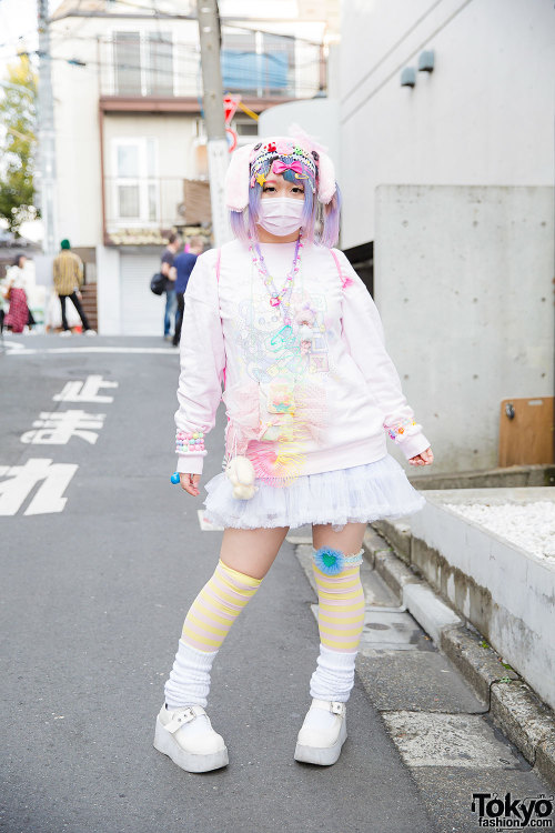 tokyo-fashion:  Maro on the street in Harajuku wearing a pastel look that features a Manamoko sweatshirt, My Little Pony sackpack, loose socks, and accessories from 6%DOKIDOKI and SPANK!. Full Look 