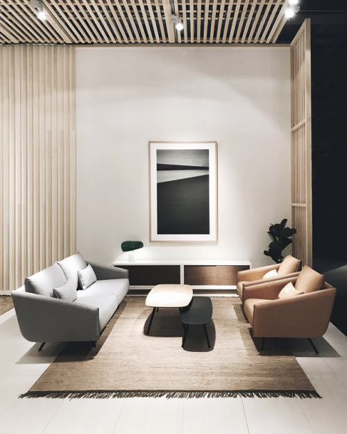 stua:  STUA living room with Costura sofa and armchairs and Solapa tables. Sapporo storage unit.SOLA