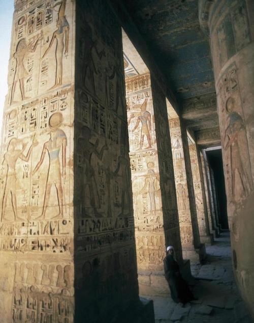 Medinet HabuView of the peristyle hall with pillars incised with hieroglyphic decorations in the Mor
