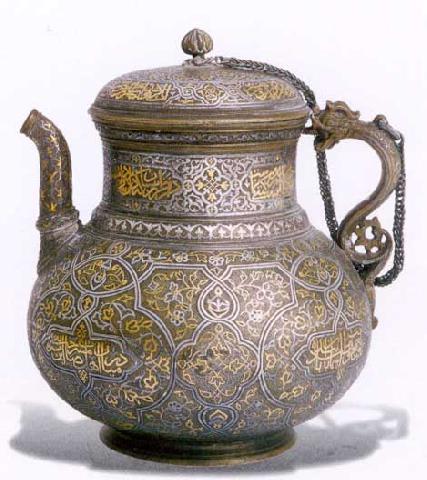 Timurid-style dragon handled jugs.  The bottom two were made in Turkey and China, respectively,