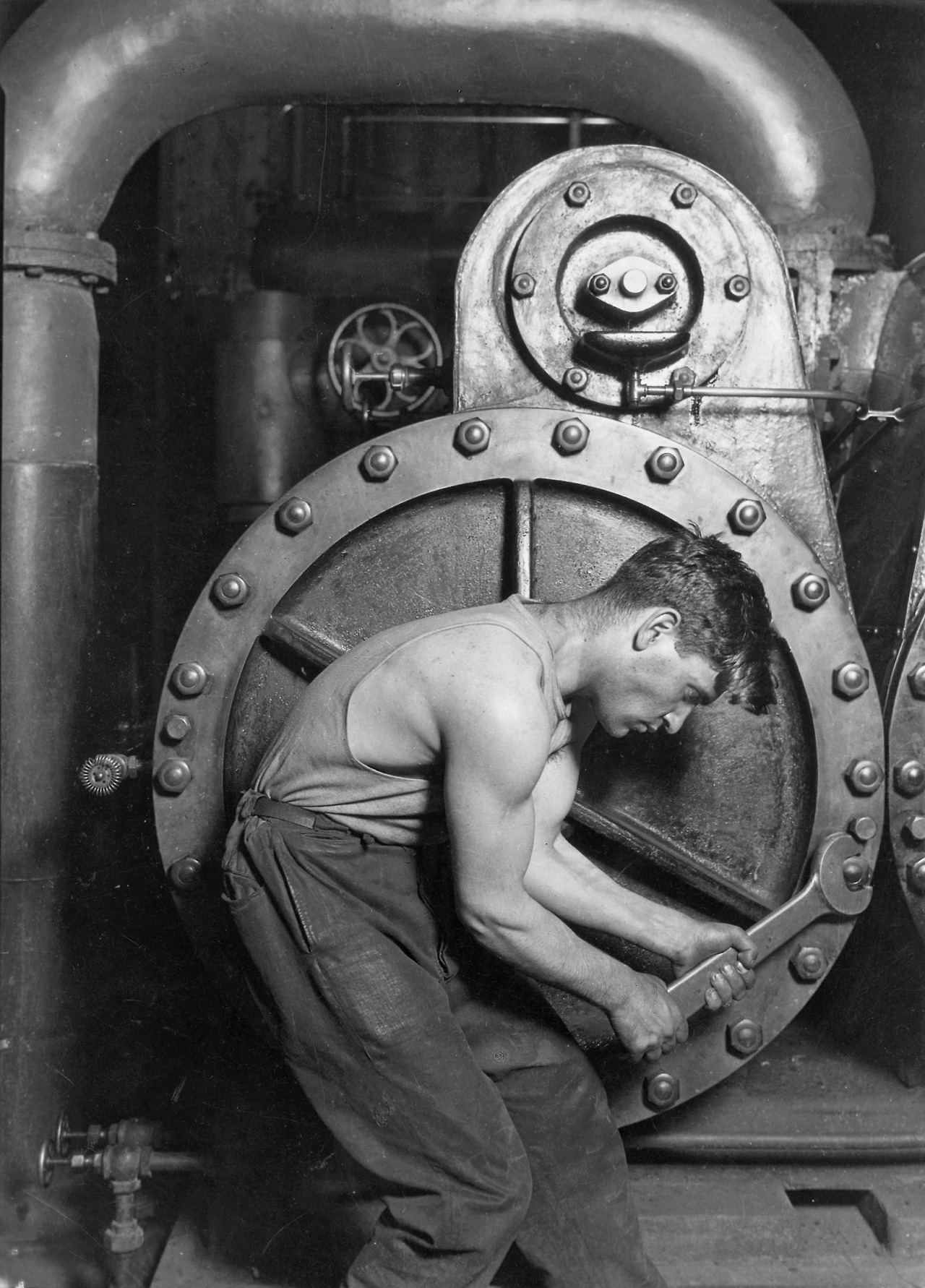 mudwerks: my-retro-vintage: Power house mechanic working on steam pump  By Lewis