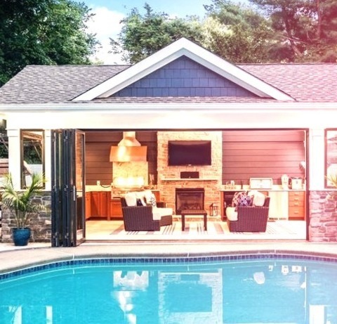 Beach Style PoolMid-sized Beach Style Backyard Concrete And Rectangular Natural Pool House Photo
