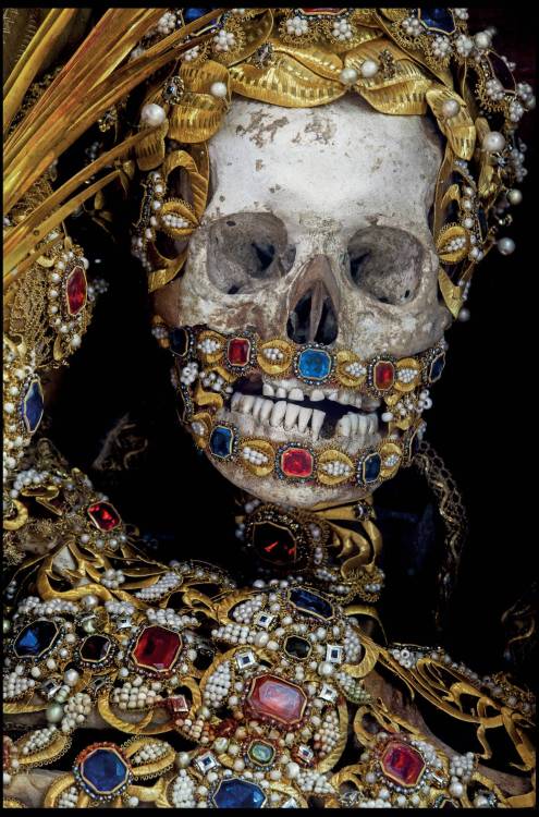 fuckyeahsexanddeath:  A relic hunter has lifted the lid on a macabre collection of 400-year-old jewel-encrusted skeletons unearthed in churches across Europe.  Art historian Paul Koudounaris hunted down and photographed dozens of gruesome skeletons in