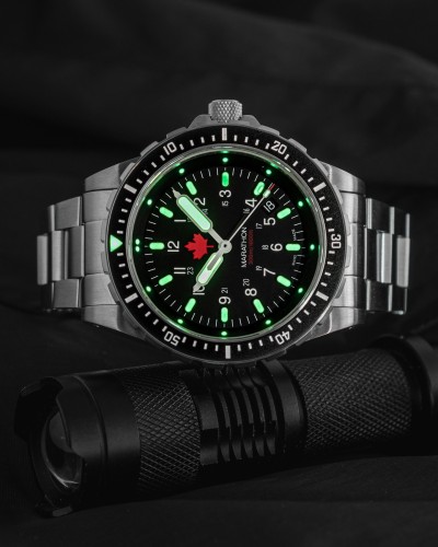 Instagram Repost

marathonwatch

Command attention even during the darkest of missions. The Marathon 46mm JSAR dive watch stands out from the pack with its exceptional Maraglo™ illumination, ensuring clear visibility in low-light environments. Engineered for military precision and uncompromising durability.

#MarathonWatch #BestInTheLongRun #DiveWatch #MilitaryWatch #LumeShot #ToolWatch #SurvivalGear #MaraGlo #CanadianWatch [ #marathonwatch #monsoonalgear #divewatch #toolwatch #watch ]