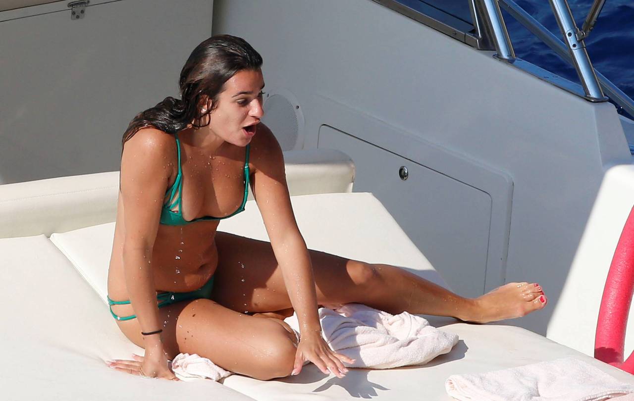 toplessbeachcelebs: Lea MicheleÂ nipple slip whileÂ swimmingÂ in Italy (July