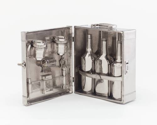 Jeff Koons, “Travel Bar,” 1986,Stainless Steel14 x 20 x 12 in. (35.6 x 50.8 x 30.5 cm.)Courtesy of C