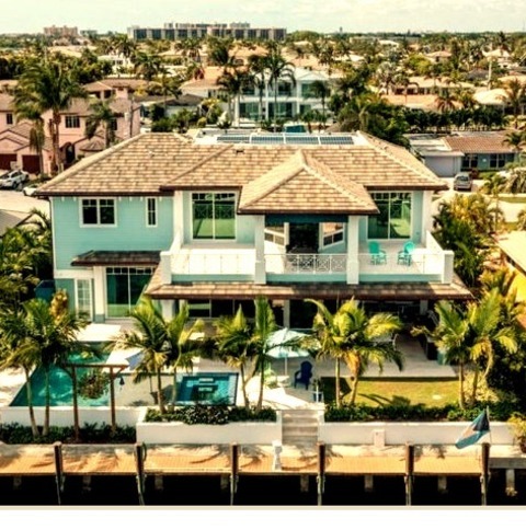 Roofing Tile In MiamiExample Of A Large Beach Style Blue Two-story Exterior Home Design With A Tile Roof