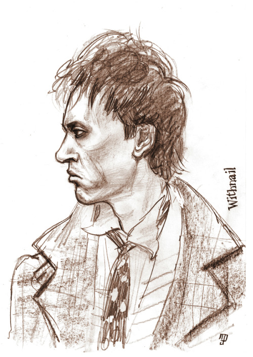 Here, hair, here… and the rest of a scruffy, young Richard E Grant’s head in profile along wi