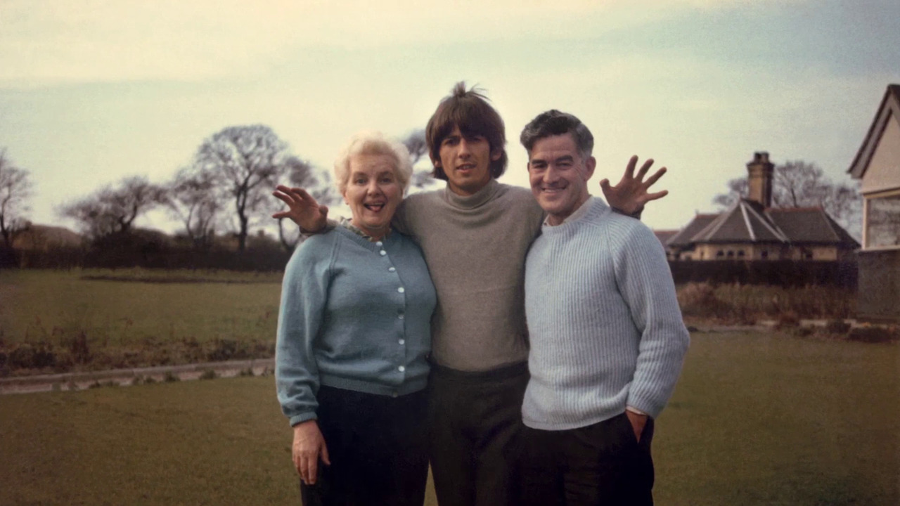 George with his parents, Louise and Harold...