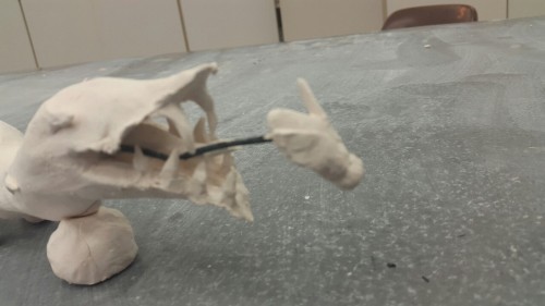 Head And Body Of A Wolf But A Venus Fly Trap For A Tail. The Wolf Is Eating The Bunny And The Tail Is