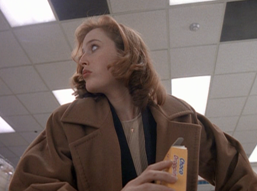 ursulastrausss: Scully looking good while eating choco droppings.