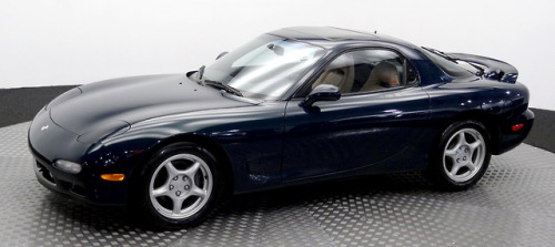 carsthatnevermadeitetc:Mazda RX-7 Touring, 1994. This car, finished in Montego Blue Metallic and fit