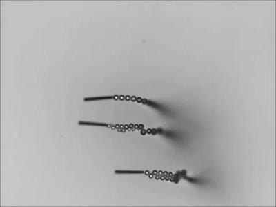 fuckyeahfluiddynamics:Shown above are a trio of microscale rockets, each about 10 microns in length.