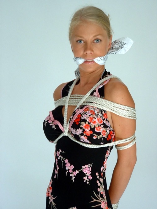 XXX graybandanna:   White bandanna gag and a photo