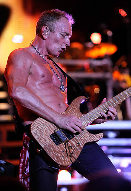 bravenew-what:Phil Collen - During Def Leppard’s performance at the Jones Beach Theater on July 30, 